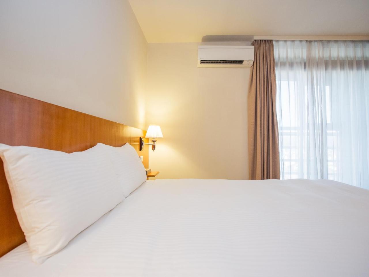 Jiuwu Hotel Лодун Экстерьер фото